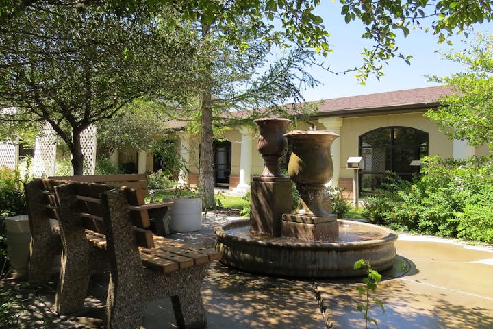 May contain: water, flagstone, chair, furniture, and patio